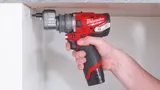 Аккумуляторная ударная дрель шуруповерт со сменным патроном Milwaukee M12 FUEL FPDXKIT-202X