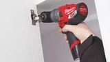 Аккумуляторная ударная дрель шуруповерт со сменным патроном Milwaukee M12 FPDX-202X