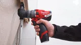 Аккумуляторная ударная дрель шуруповерт со сменным патроном Milwaukee M12 FPDX-0